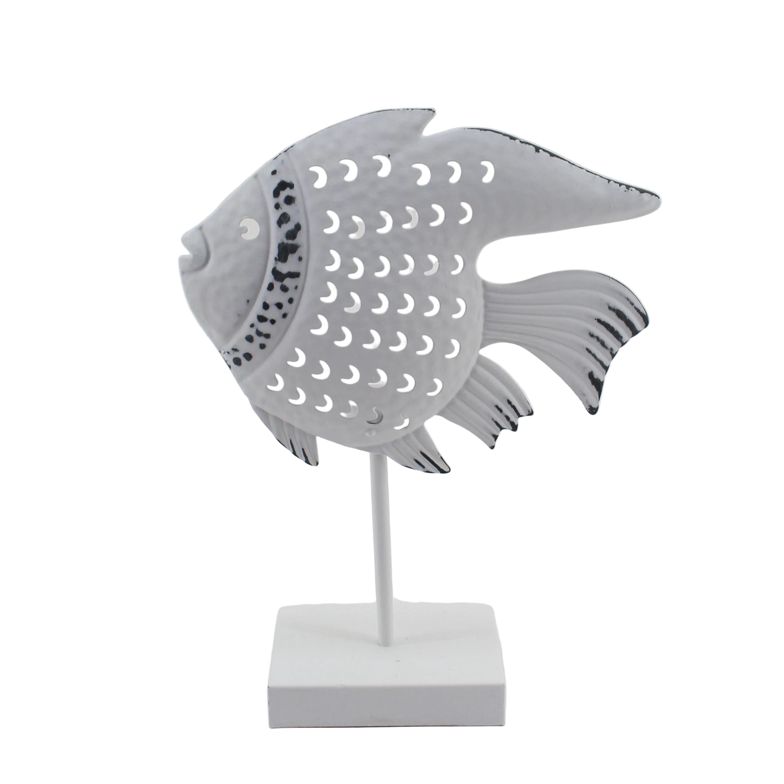Decorative fish-shaped object on a stand against a white background
