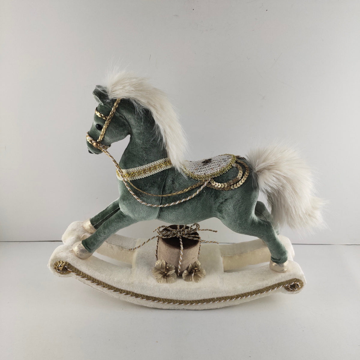 GREEN VELVET ROCKING HORSE