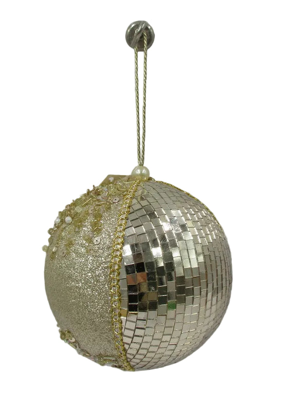 A gold disco ball Christmas ornament with mirrored tiles and a beaded gold trim, hanging from a gold string.