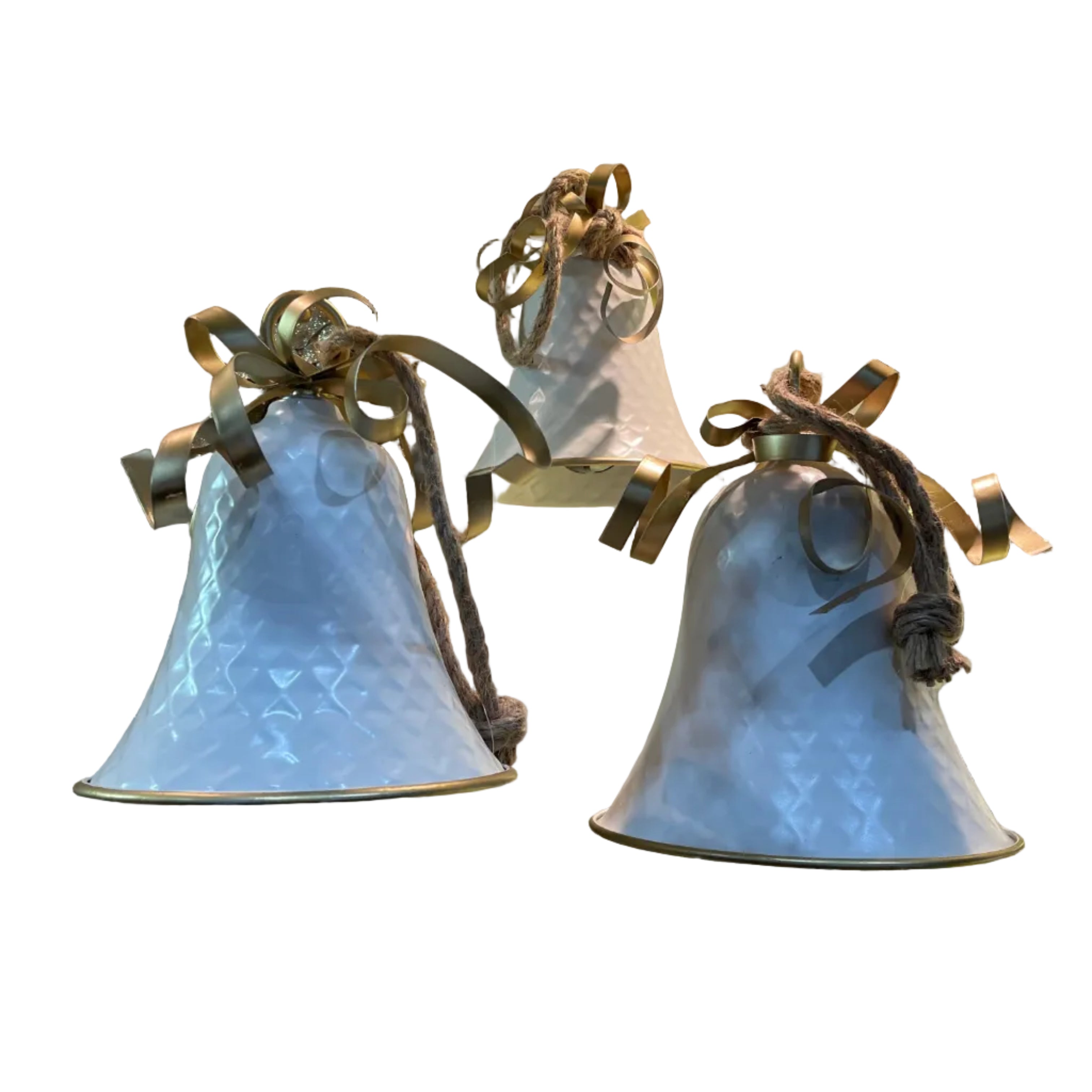 Three white and gold metal textured hanging Christmas bells with gold ribbons and brown rope hangers
