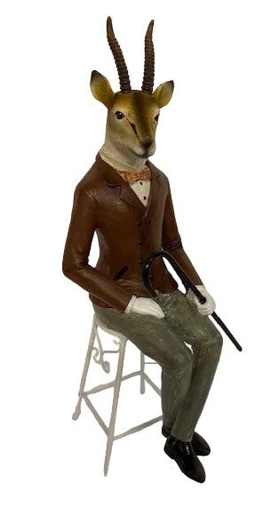 DEER IN TALL CHAIR