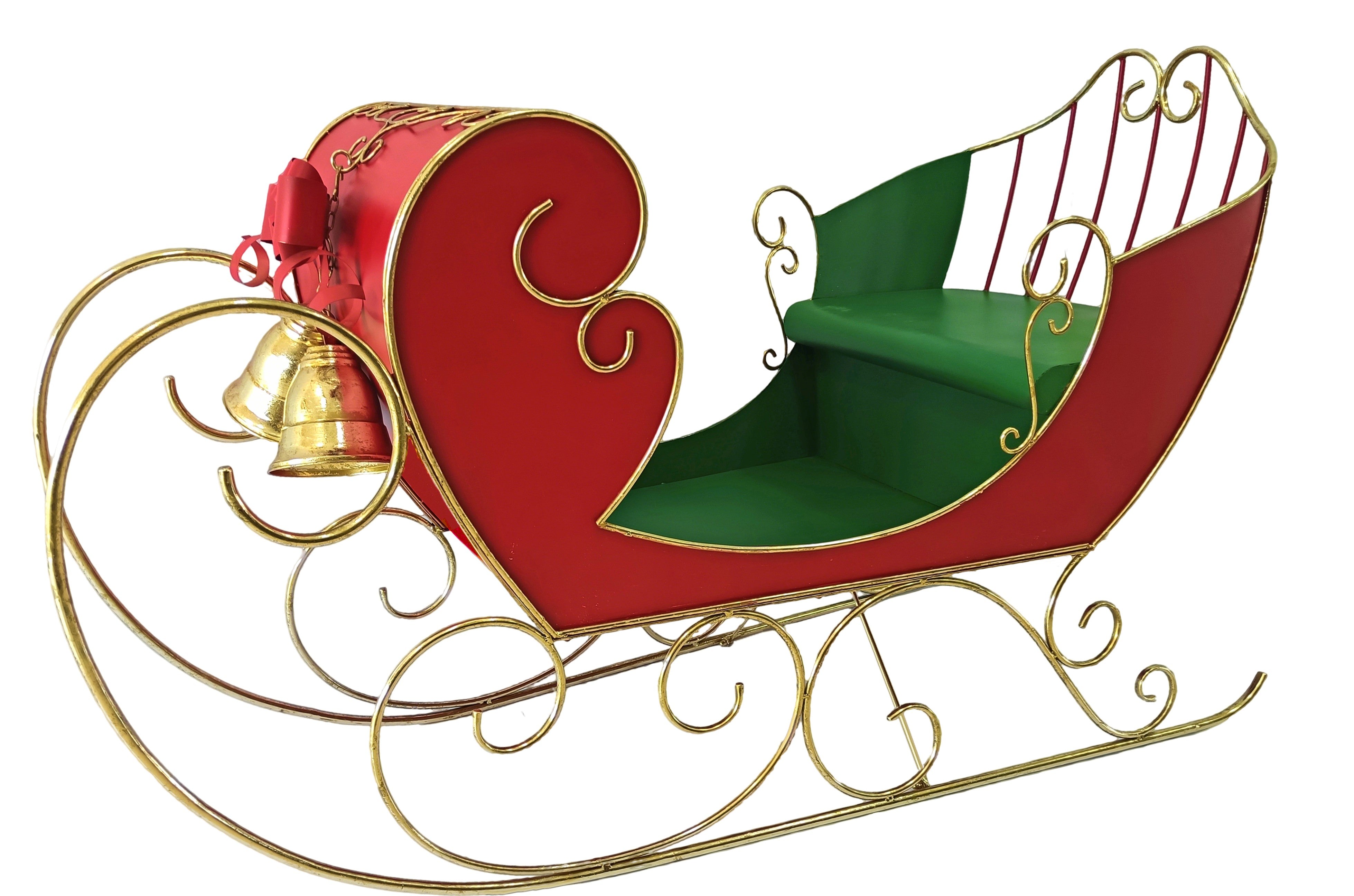 A festive Christmas sleigh decoration with a red body with a green seat and  a gold scrollwork frame, finished with a gold bell and a red bow