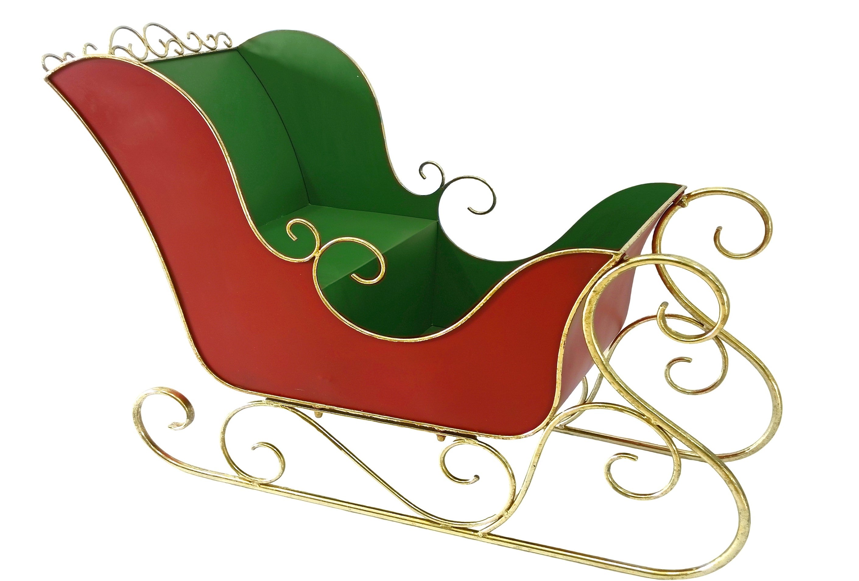 A decorative Christmas sleigh with a red body, green interior, and ornate gold metal scrollwork