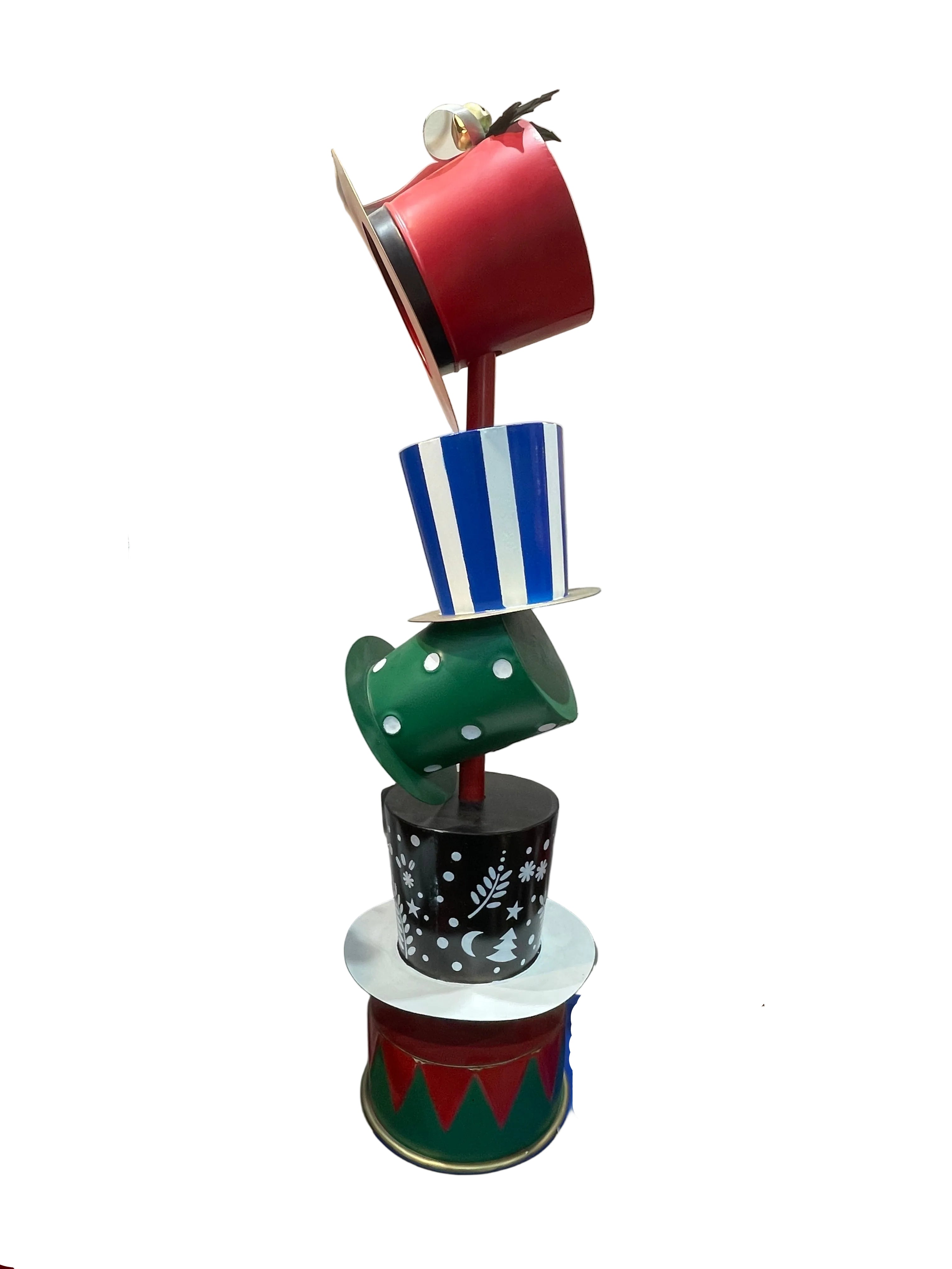 A festive Christmas display featuring a tall stacked hat tree centerpiece with red, blue-and-white striped, green, and black top hats