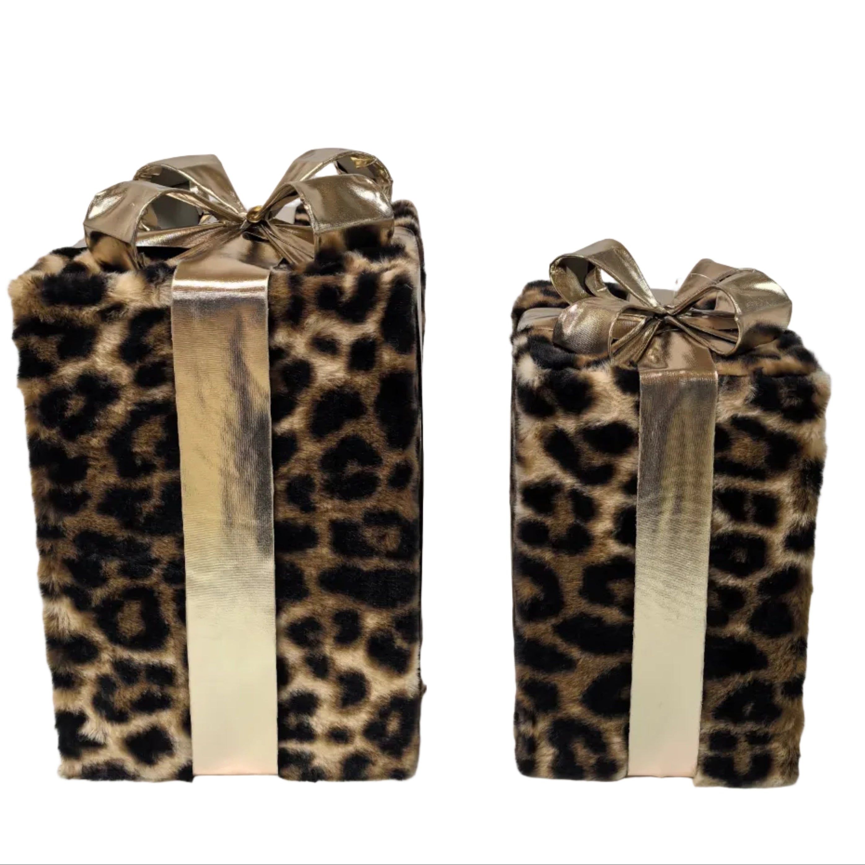 Two leopard-print gift boxes with metallic gold ribbons and bows
