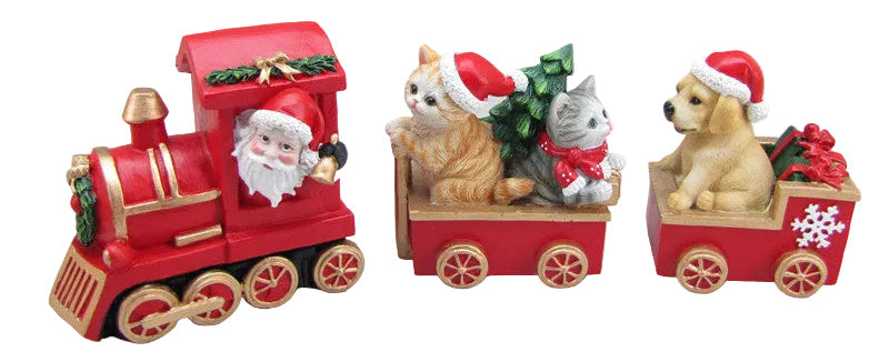 A decorative figurine featuring a red train with a Santa Claus driving the train, accompanied by 2 cats and a brown dog, all sitting in the train cars.