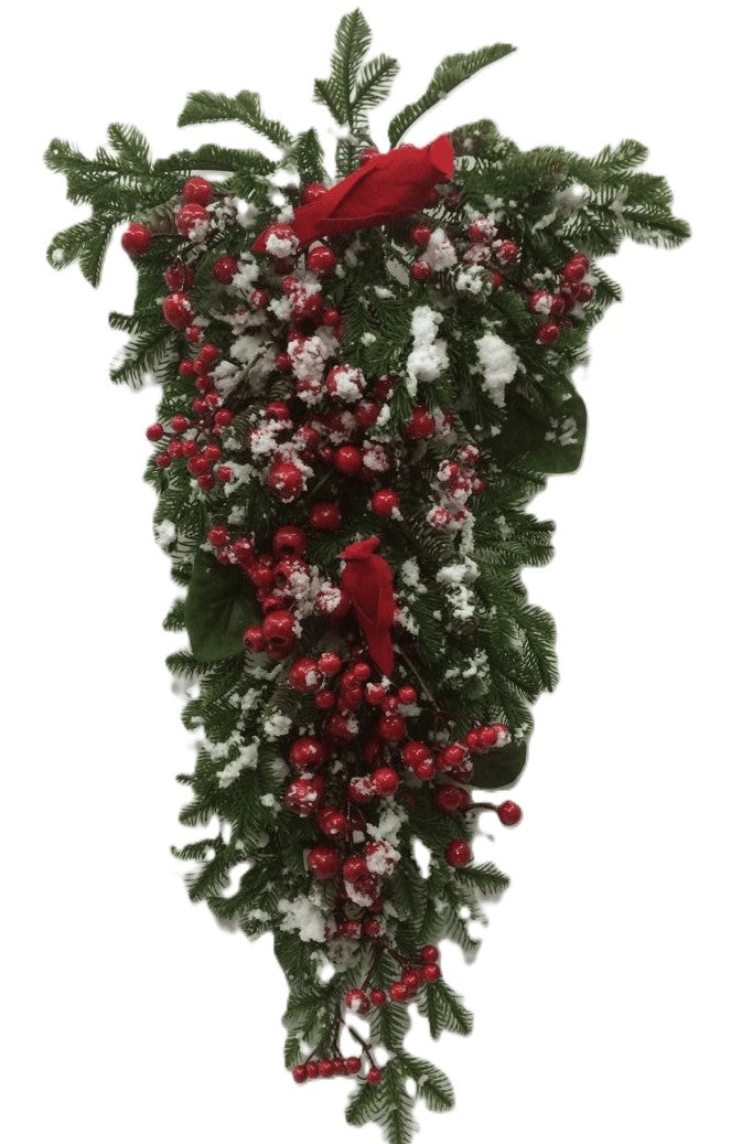 A festive Christmas wreath or hanging garland made of green pine branches, covered with red berries, white snow-like accents, and two red birds.