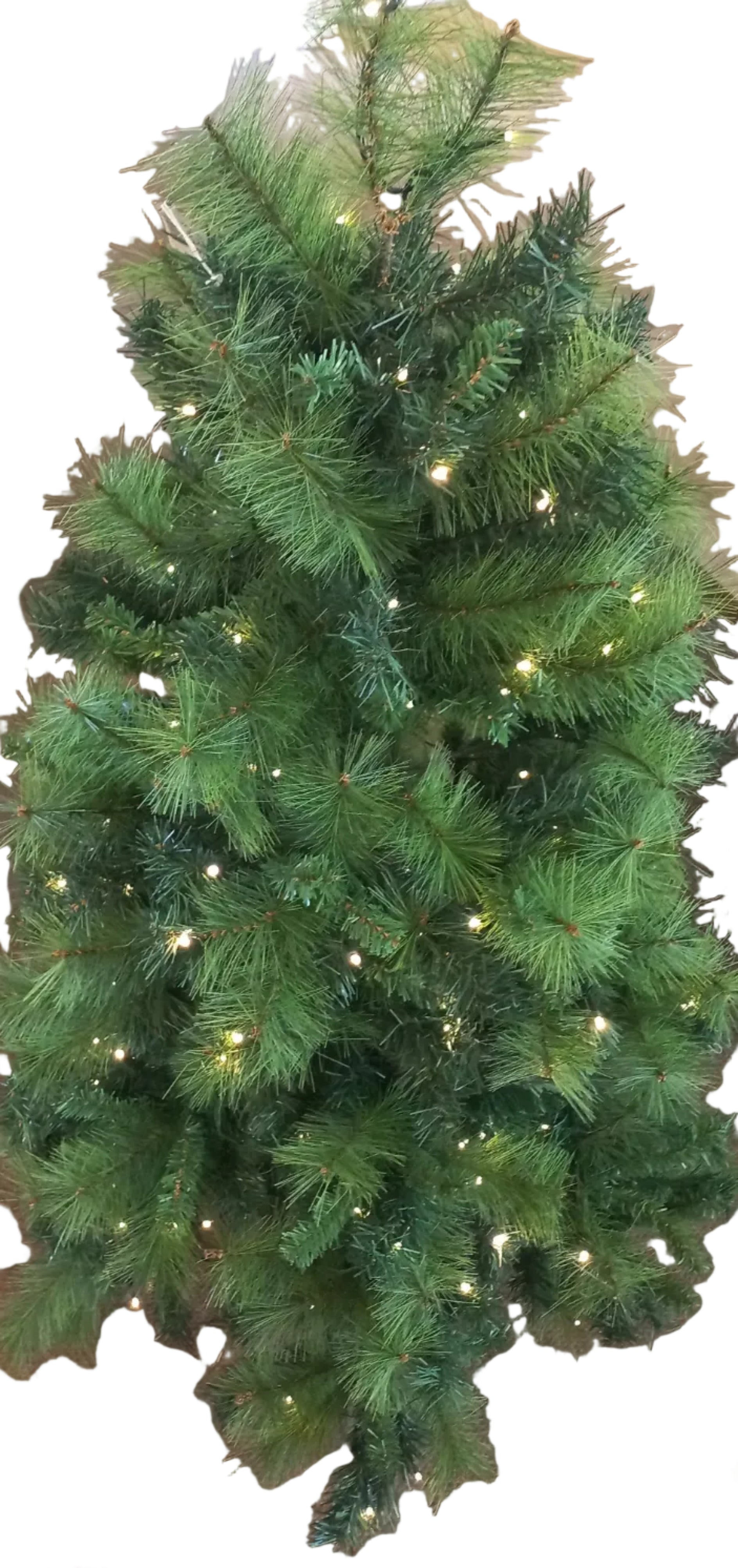 A 4ft artificial Christmas tree decorated with white lights.